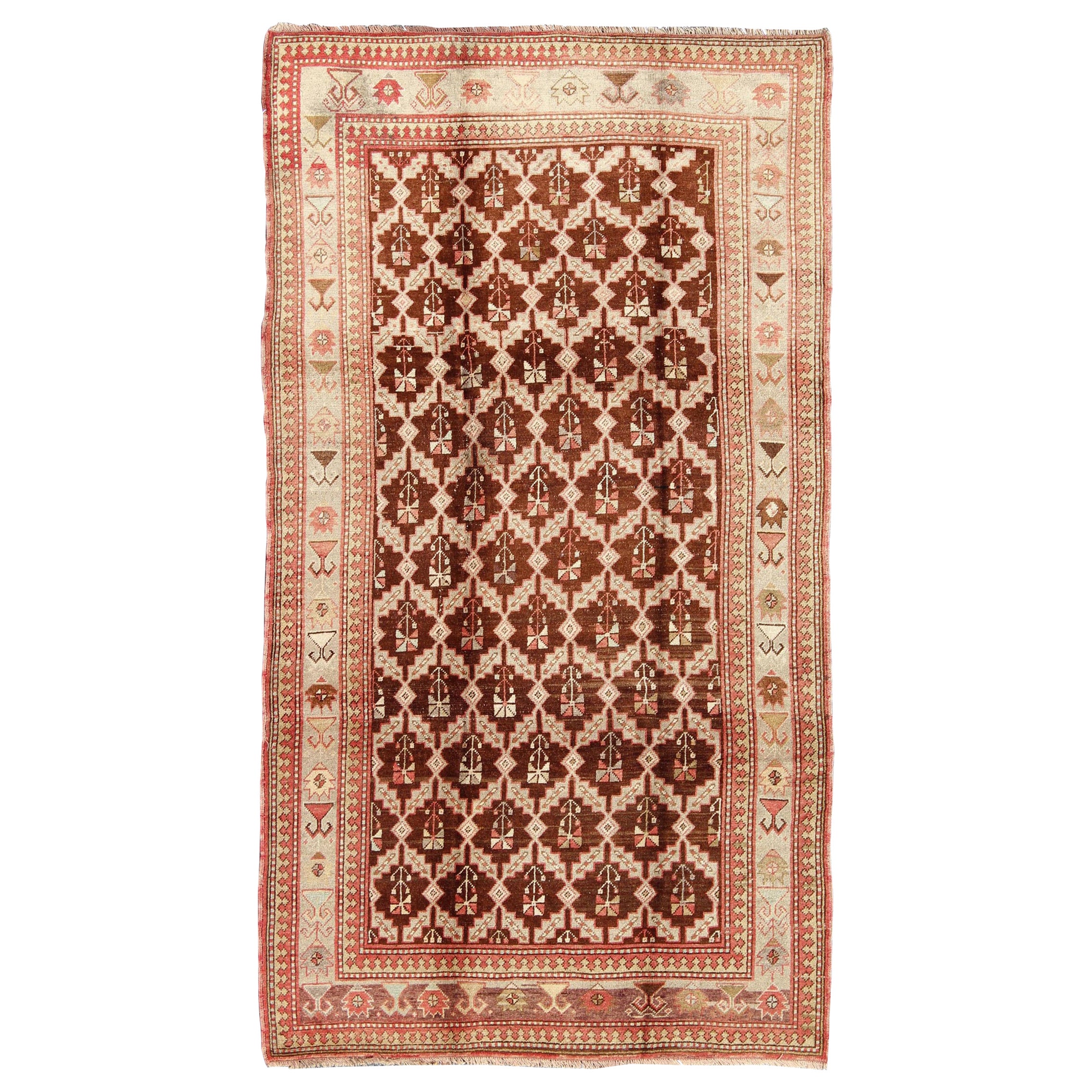 Unique Antique Turkish Oushak Rug in Brown, Taupe, Pale Green and Coral For Sale