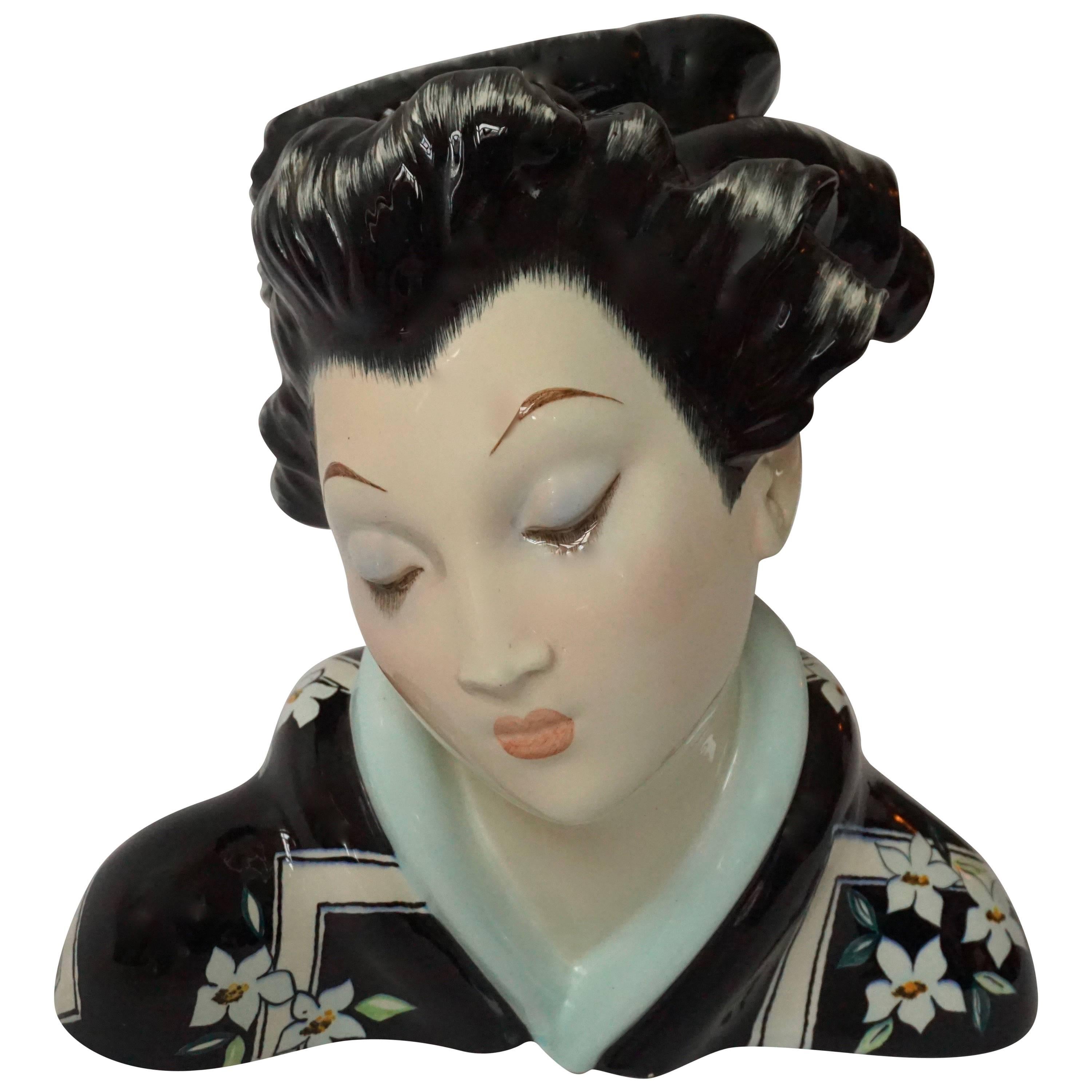 Japanese Porcelain Sculpture of a Geisha