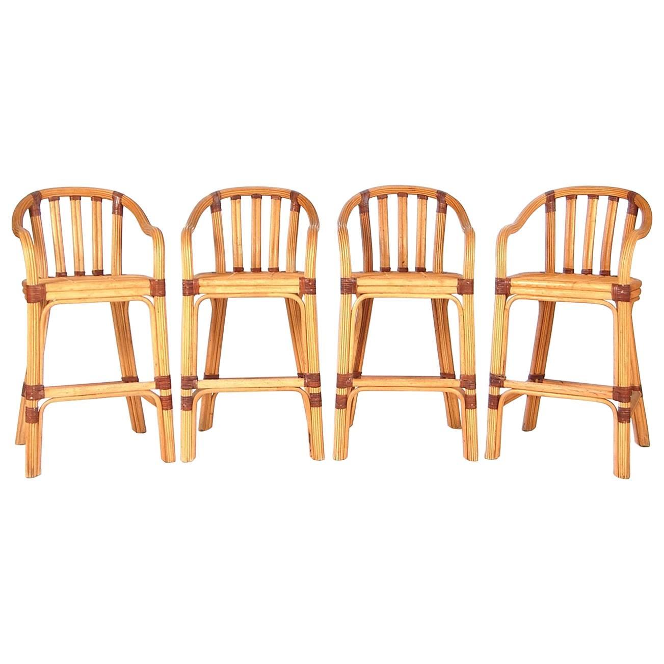 Set of Four Rattan and Leather Bar Stools by McGuire For Sale