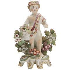Bow Figure of a Putti Holding a Basket of Fruit, circa 1765