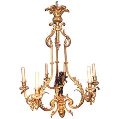 Gilt Bronze Cage Form Chandelier with Patinated Cherub 7