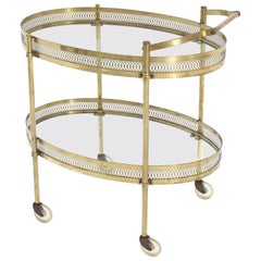 Oval Pierced Brass and Glass Two-Tier Tea Serving Cart on Wheels