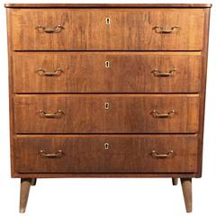 Swedish Veneered Wood and Brass Four-Drawer Chest, 1950s