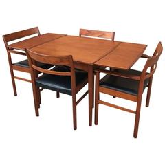 Danish Modern Teak Extension Dining Set by Kurt Ostervig