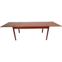 Impressive Mid-Century Modern Teak Draw-Leaf Dining Table