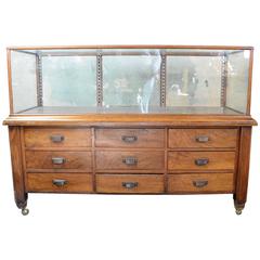 Handsome Wood Display Case with Cast Brass Hardware and Drawers