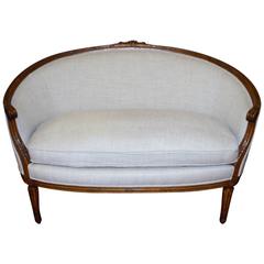 Louis XVI Style Wlanut Settee Newly Upholstered in Linen