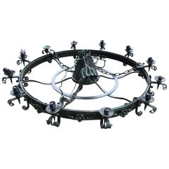 Retro Enormous Crafted Wrought Iron Chandelier w. 12 Torch Lights and One Centre Light