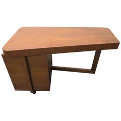 Mid-Century Modern Asymmetrical Walnut Desk Attributed to Gilbert Rohde