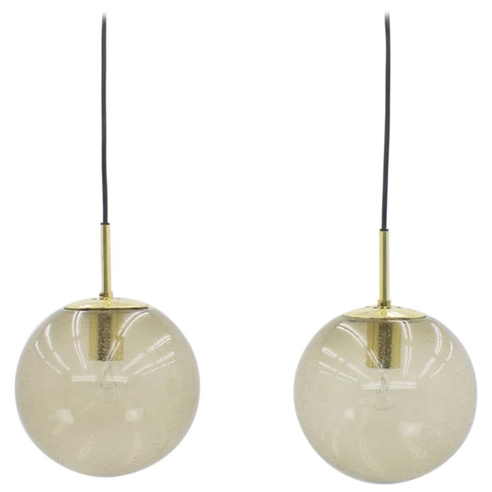 Limburg Pair of Smoked Glass and Brass Glass Ball Pendants 1960s
