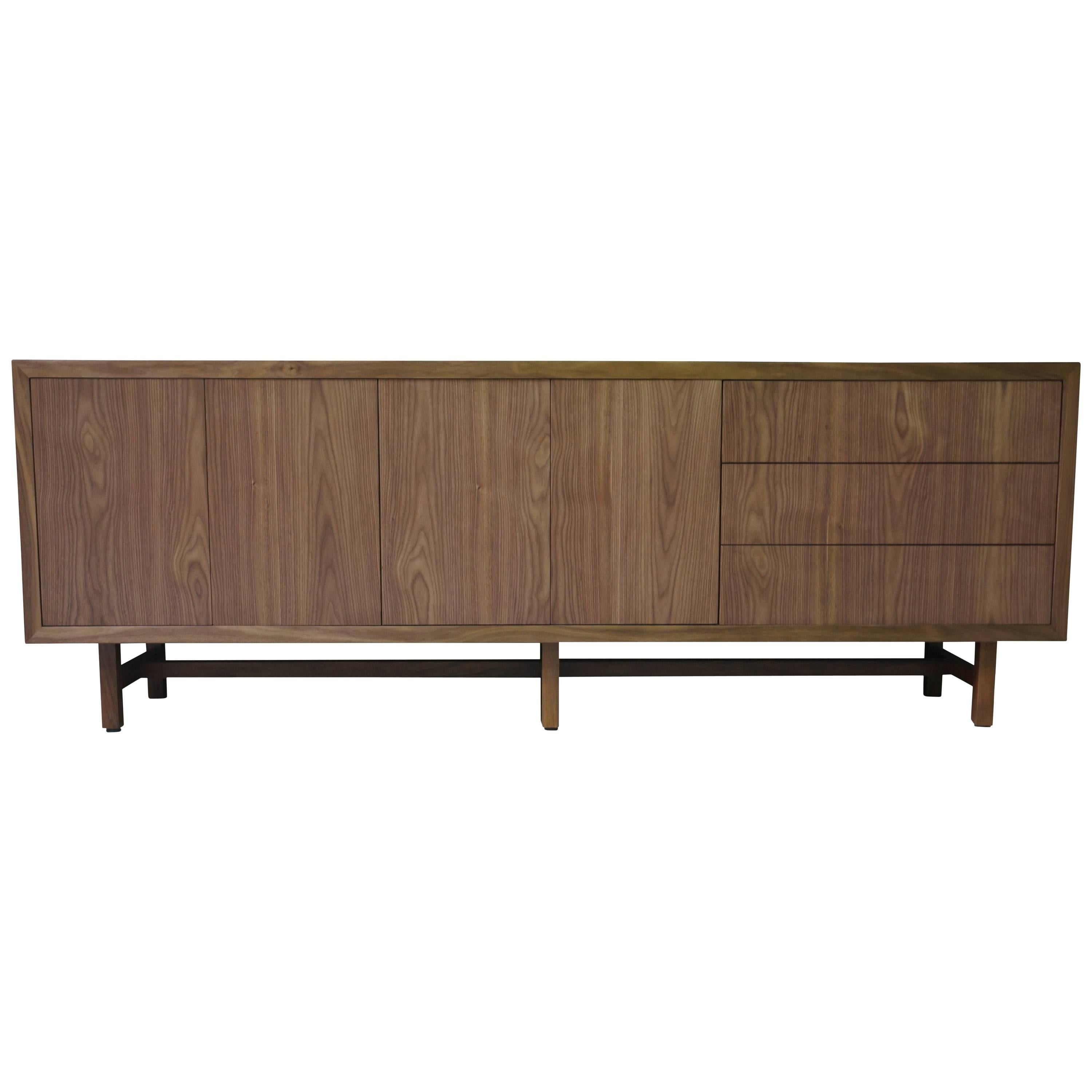 The Salvatore Credenza can be made in any size, with any combination of drawers and doors. Shown here in Argentine Rosewood but available in any material or finish and with any style pull.