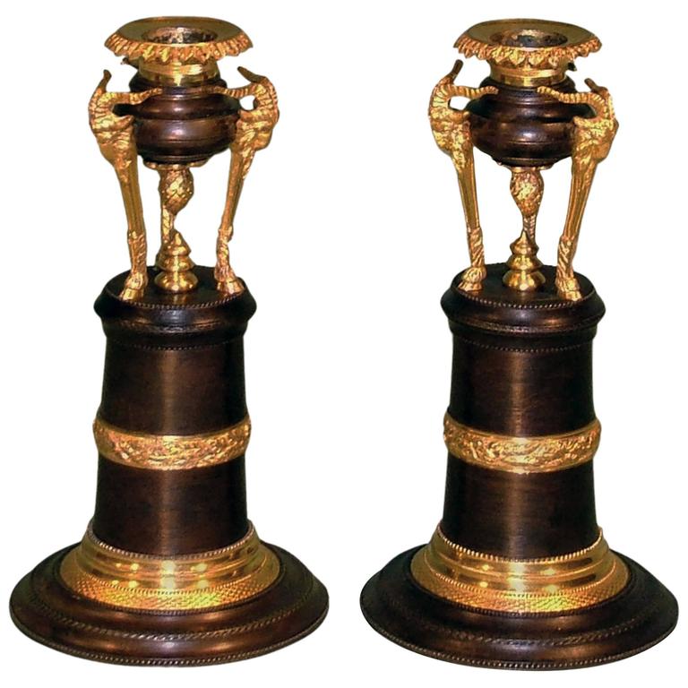 Pair of Regency Bronze and Ormolu and Ram's Head Candlesticks For Sale