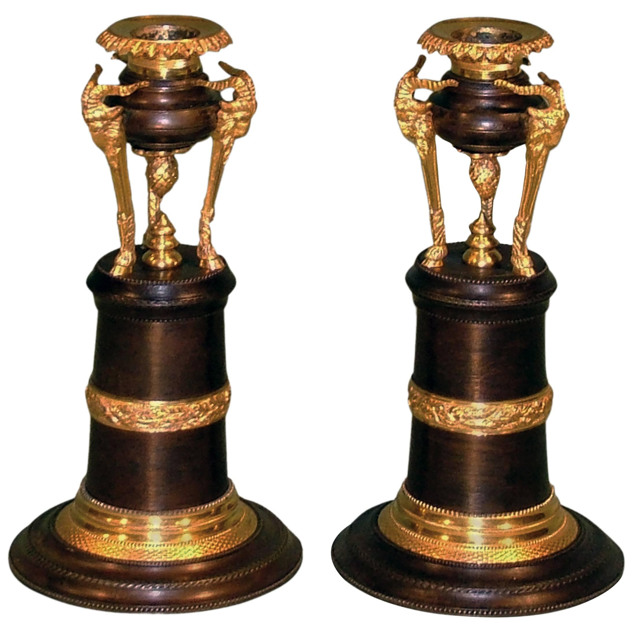 Pair of Regency Bronze and Ormolu and Ram's Head Candlesticks