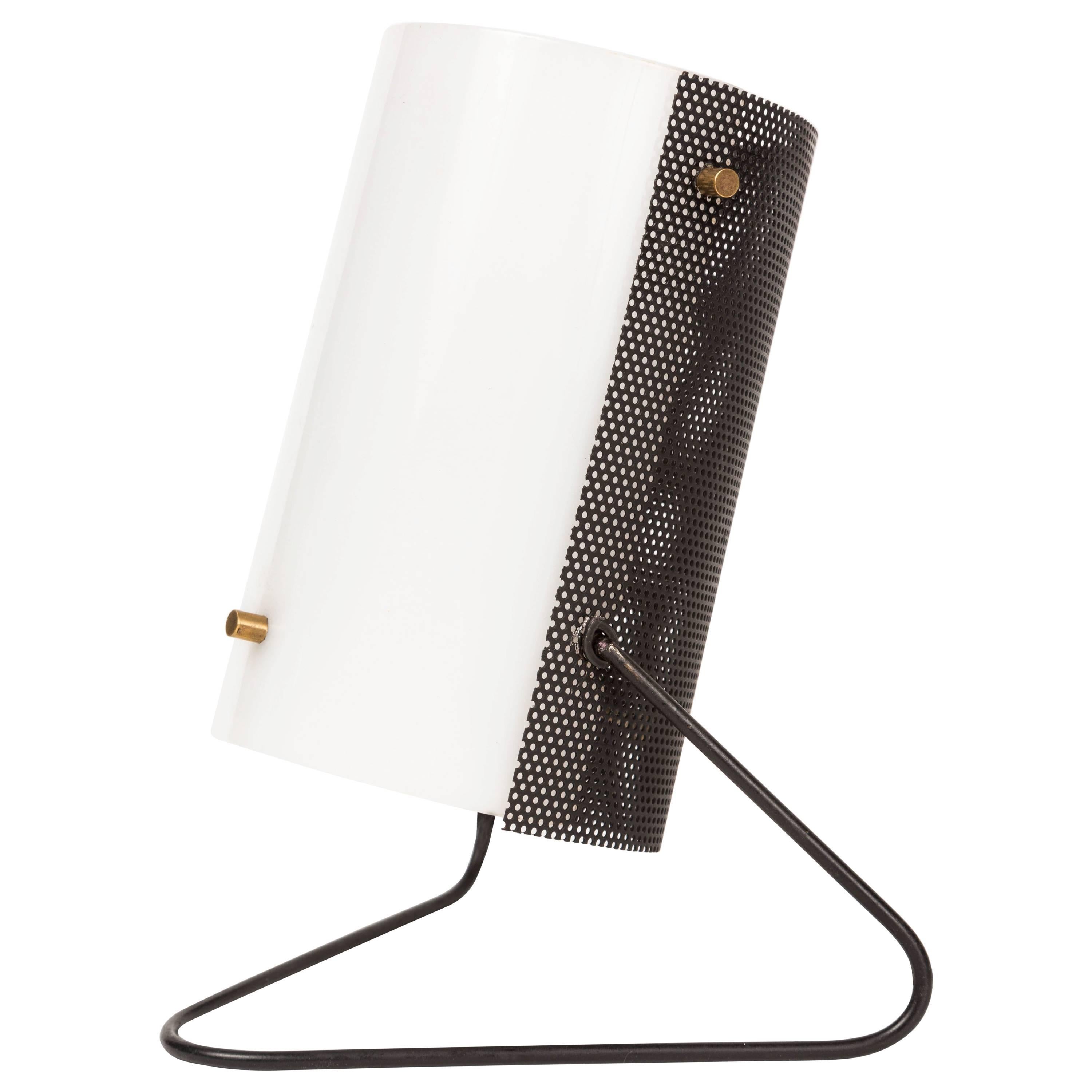 1960s Stilux Milano perforated metal table lamp. This petite and whimsical design echoes those of Mathieu Matégot, but with a quintessentially 1960s Italian twist. Executed in perforated painted metal, clean white Perspex, brass hardware on a
