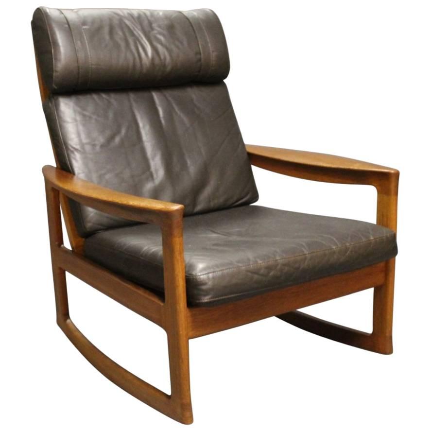 Rocking Chair in Teak and Black Leather by Ole Wanscher and Komfort, 1960s