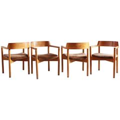 Set of Four Oak Curved Backed Dining Chairs with Brown Corduroy Seat Cushions