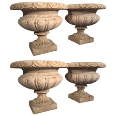 Set of Four Large Carved Limestone Urns from Michael and Diandra Douglas Estate