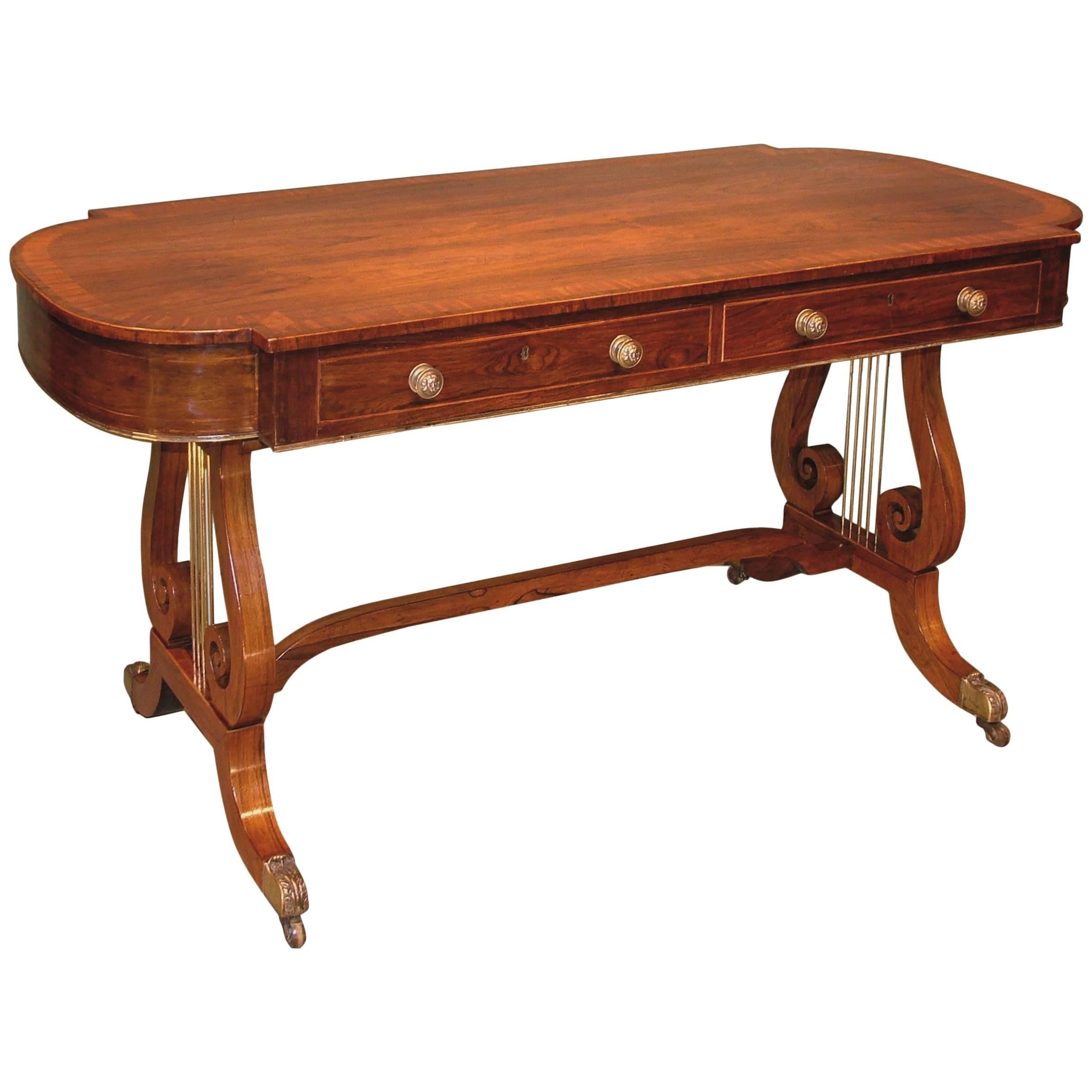 Regency period rosewood writing table with lyre supports