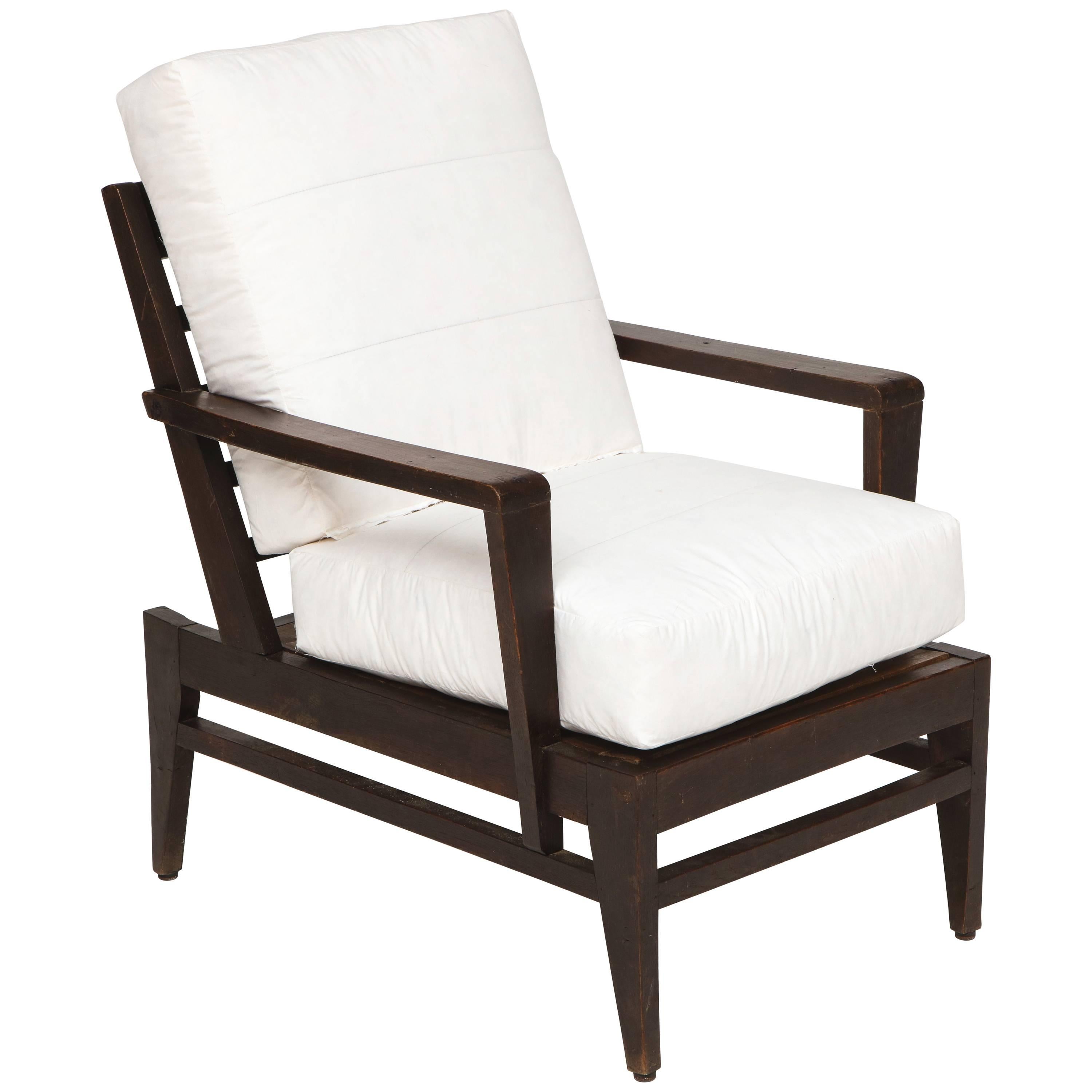 Rene Gabriel dark wood oak lounge chair white cushion midcentury, France, 1950s
Beautiful construction and bones. The chair currently has foam/down muslin cushions that can be upholstered in any fabric.
Beautiful furniture example of postwar
