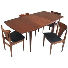 1970s Danish Extendable Teak Dining Table and Four Teak and Vinyl Chairs