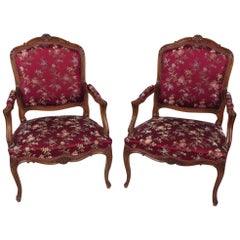Pair of Early 20th Century French Carved Walnut Fauteuils
