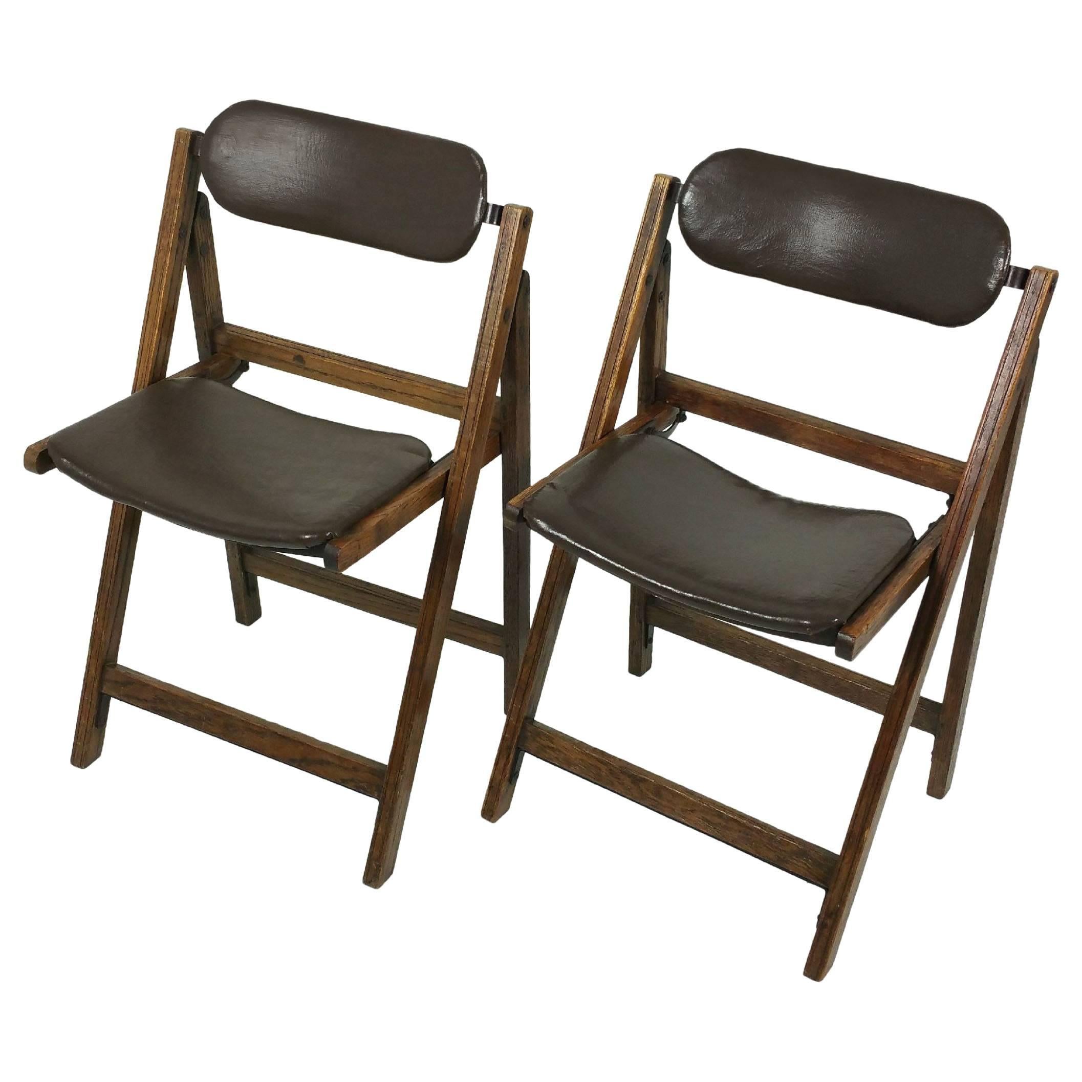 Pair of Edwardian Oak and Leather ‘Tansad’ Folding Chairs
