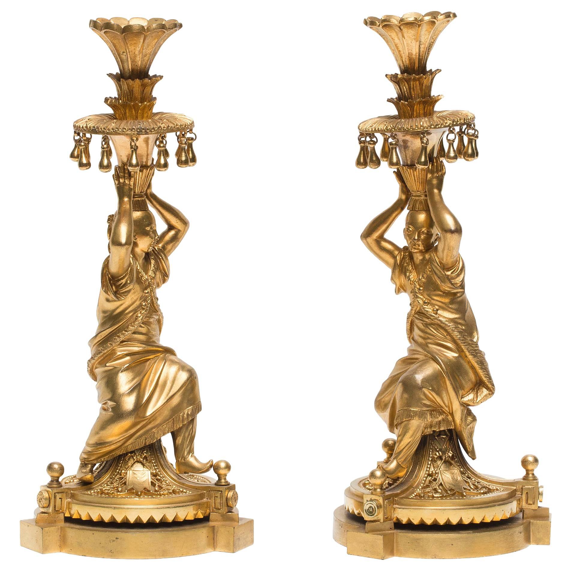 Rare Pair of Gilt-Bronze 'Chinese' Figural Candlesticks, circa 1790-1800 For Sale