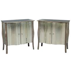 Pair of Antiqued Mirror Serpentine Cabinets