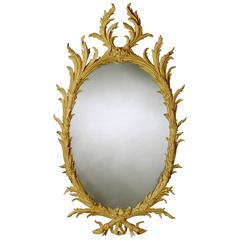 Early George III 18th Century Oval Carved Giltwood Mirror
