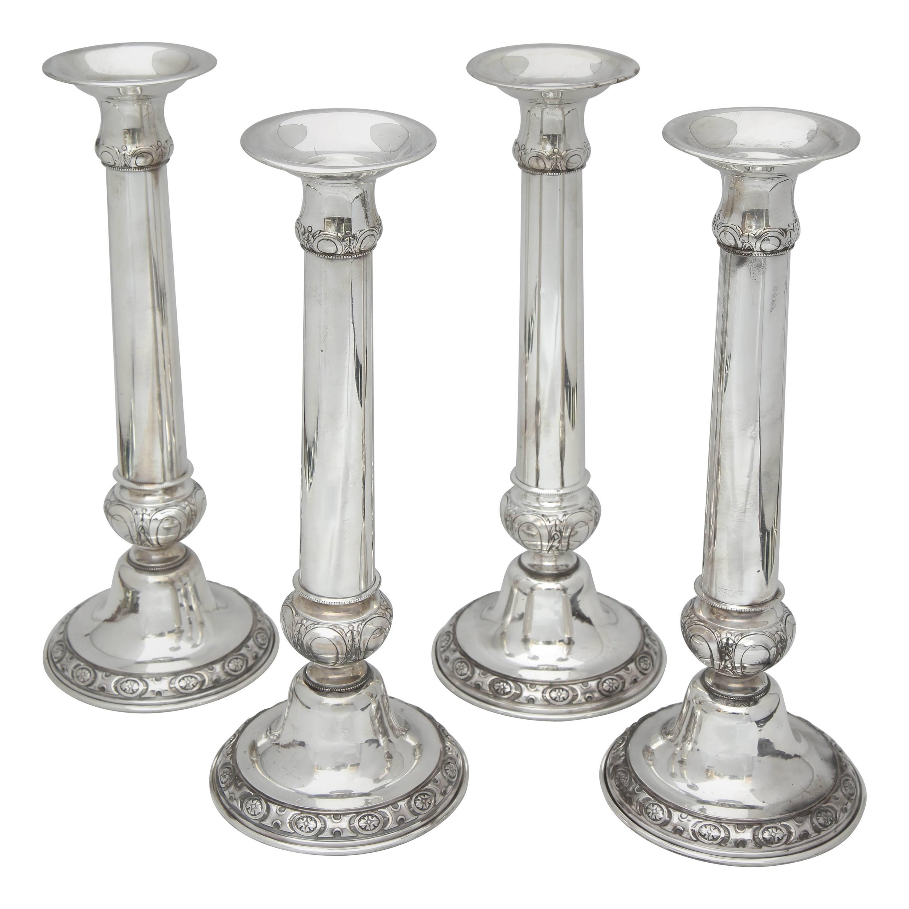 Suite of Four Tall Neoclassical-Style Sterling Silver Candlesticks