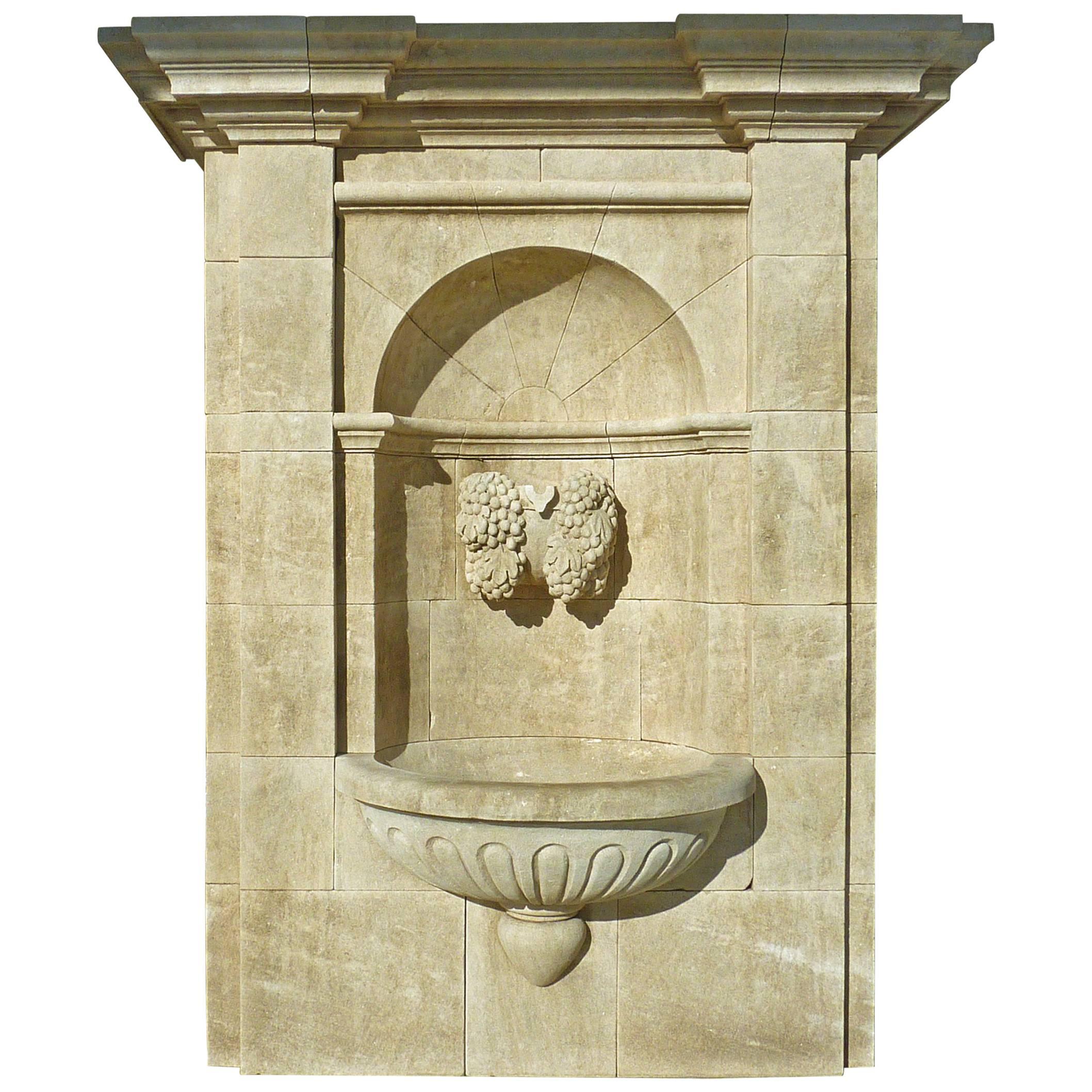 Impressive Wall Fountain in French Natural Limestone with Hand Sculpted Vine For Sale
