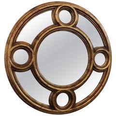 Patina Carved Giltwood Convex Wall Mirror by Baker, offered by La Porte