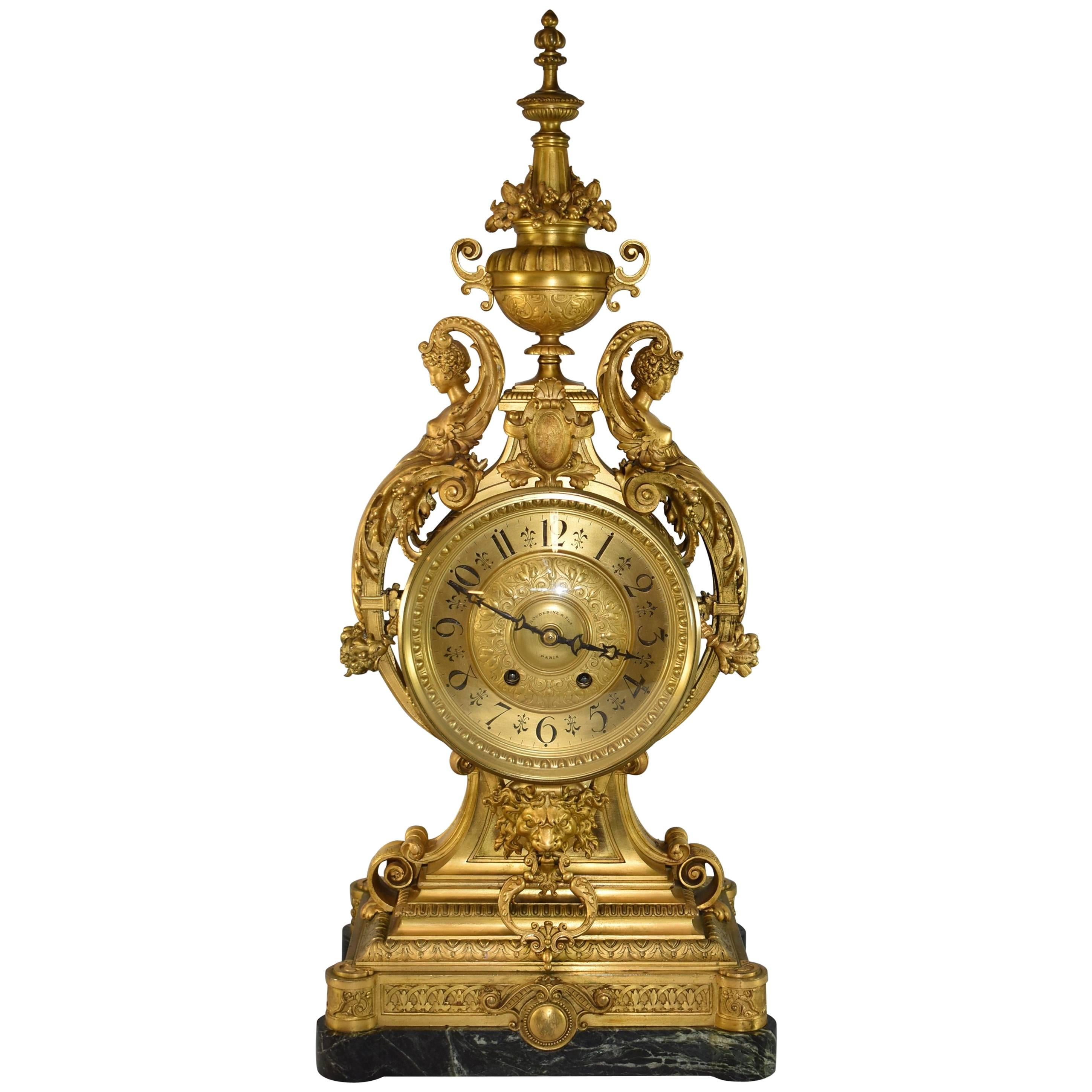 French Bronze Dore Clock with Figural Details by Houdebine & Fils