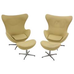 Pair of Danish Modern "Egg" Chairs and Ottomans by Arne Jacobsen