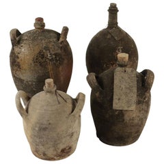 Collections of Empty Old Bottles in Terra Cotta