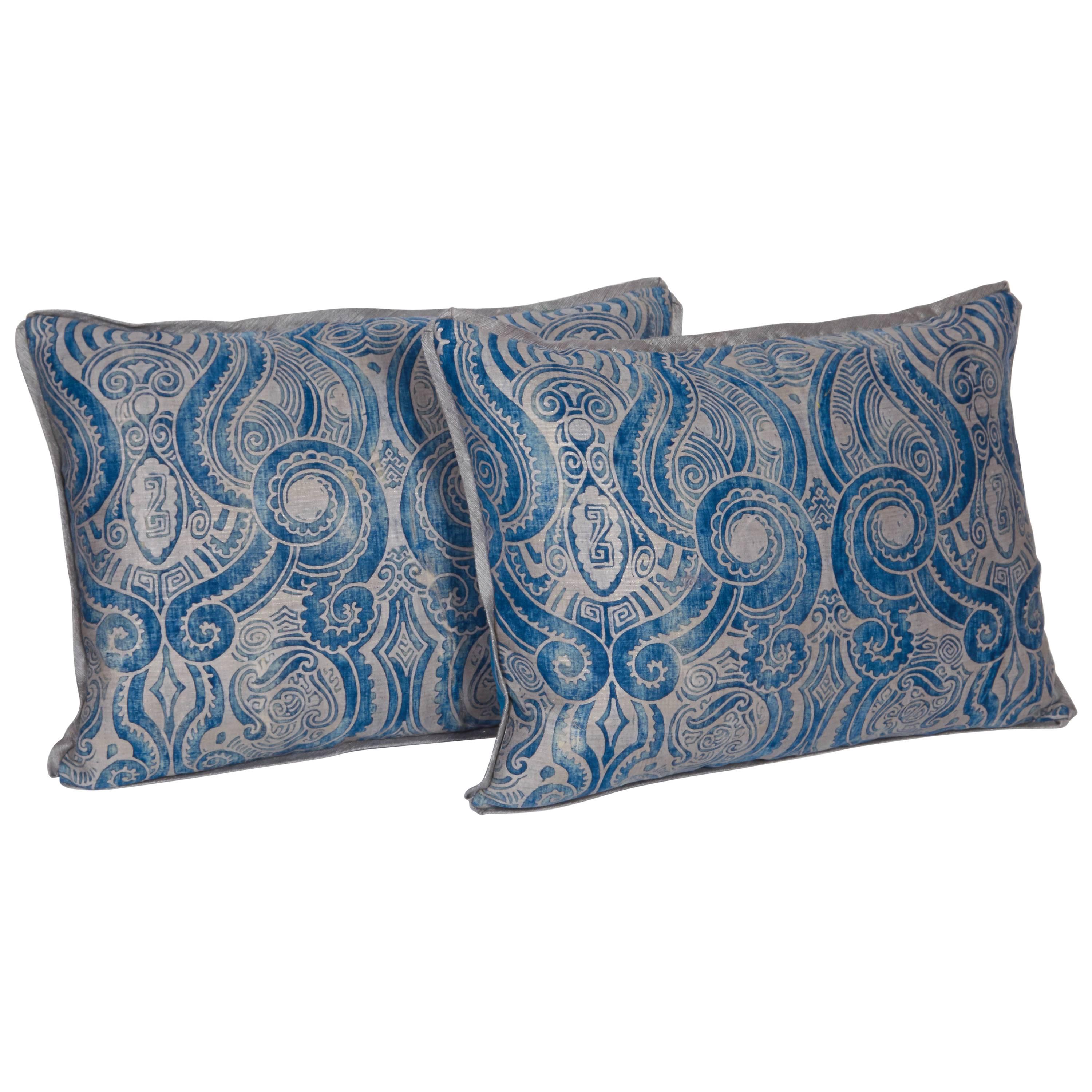A Pair of Fortuny Fabric Lumbar Cushions in the Peruviano Pattern