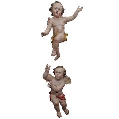 Pair of Painted Carved Wood Putti with Glass Eyes
