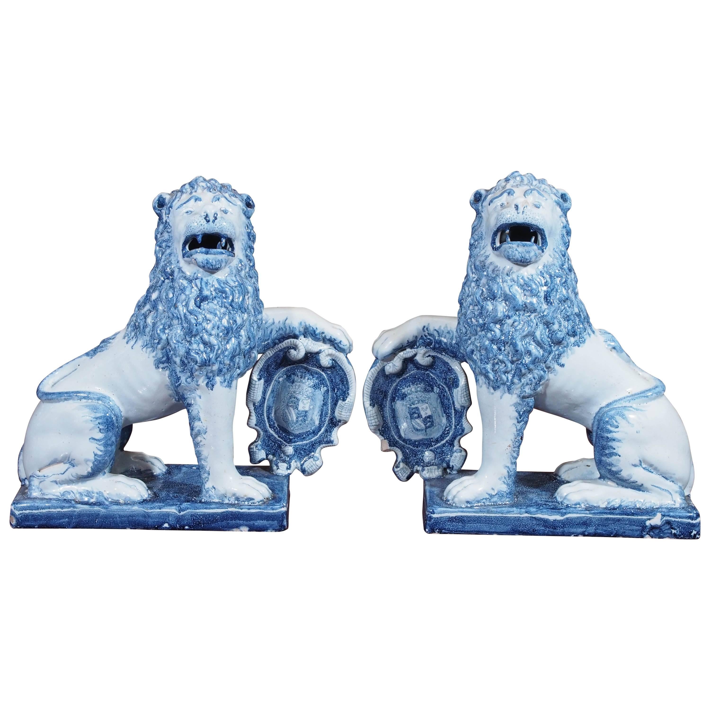 Pair of Blue and White Delft Lions with Shields For Sale