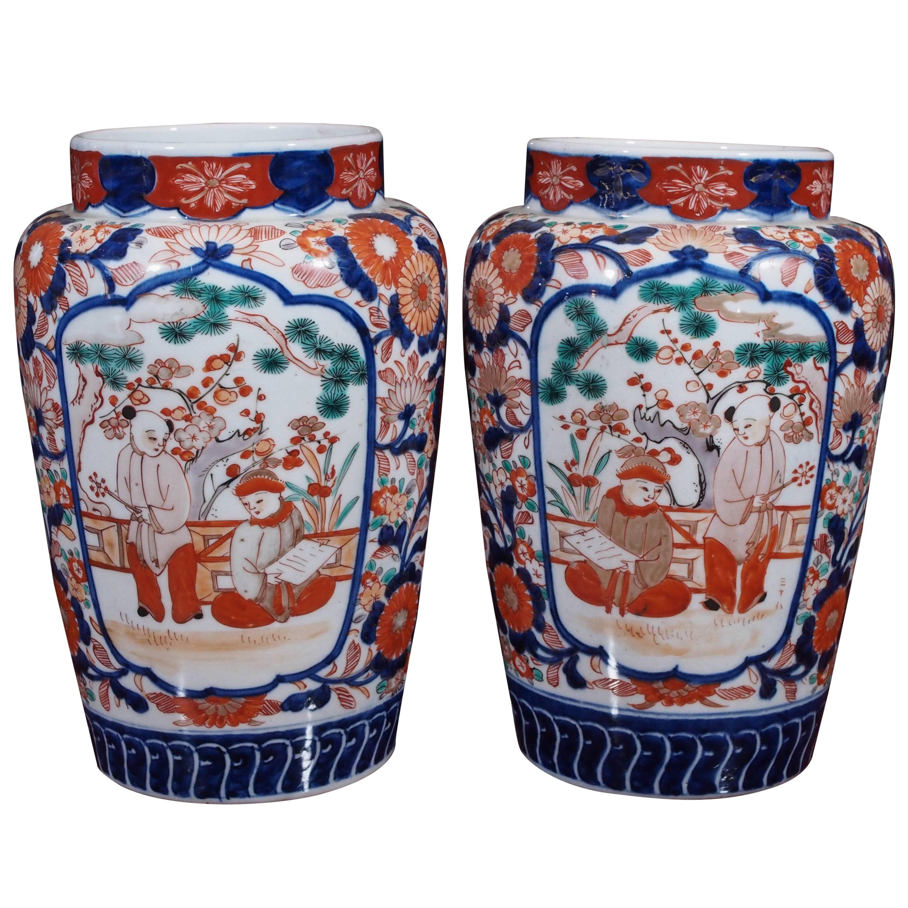 Pair of Imari Ribbed Jars with Small Boys in a Garden