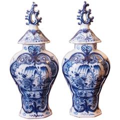 Pair of Delft Blue and White Lidded Garniture Vases 10