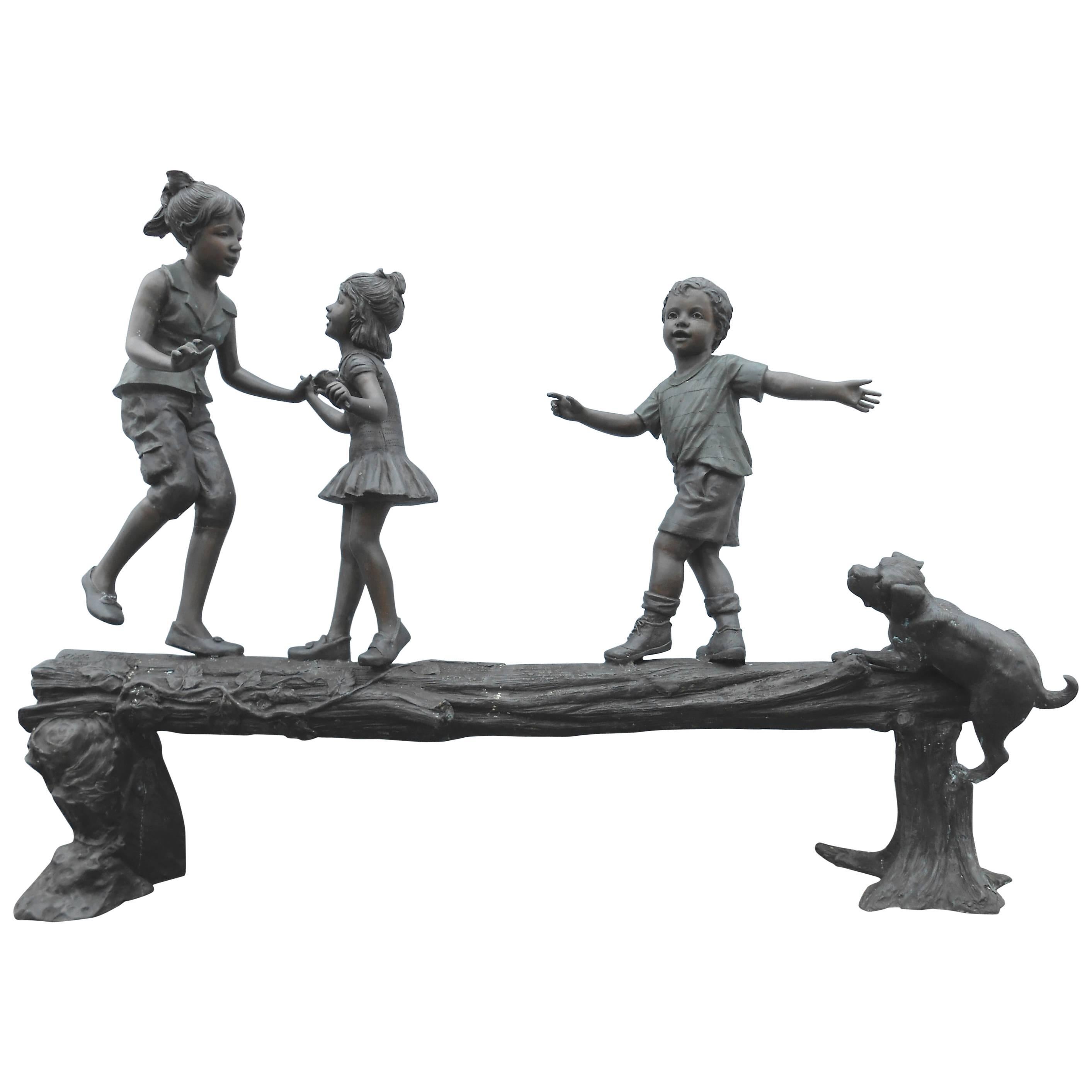 Bronze Statue of Three Children and a Puppy on a Log by AJ John