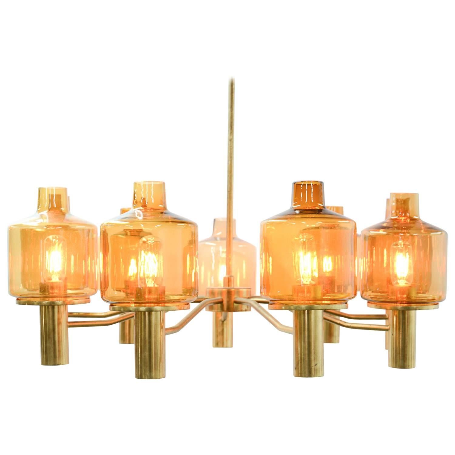 Hans-Agne Jakobsson Nine-Arm Brass Chandelier with Amber Glass