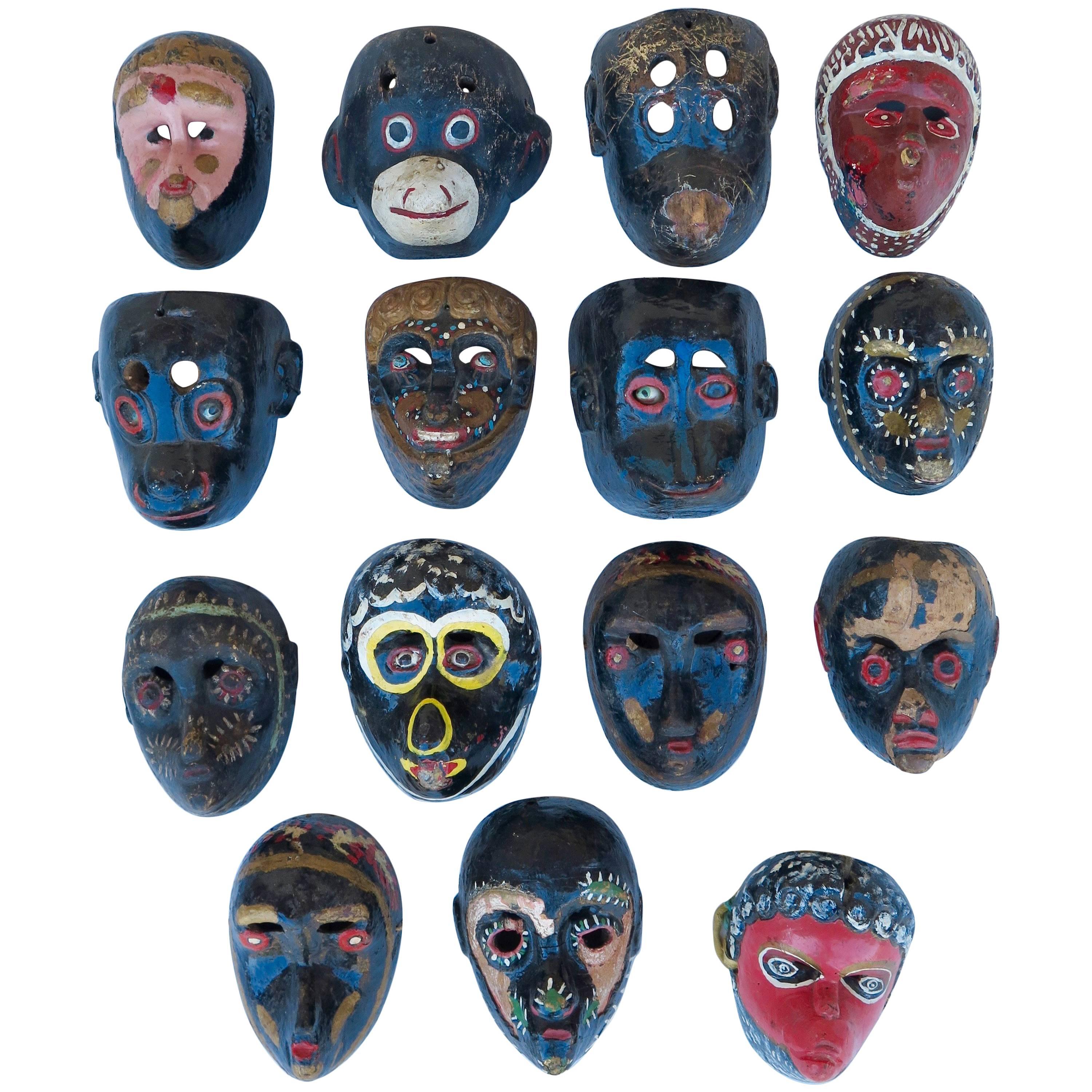 Incredible Collection of '15' Mico Monkey Masks from Guatemala For Sale