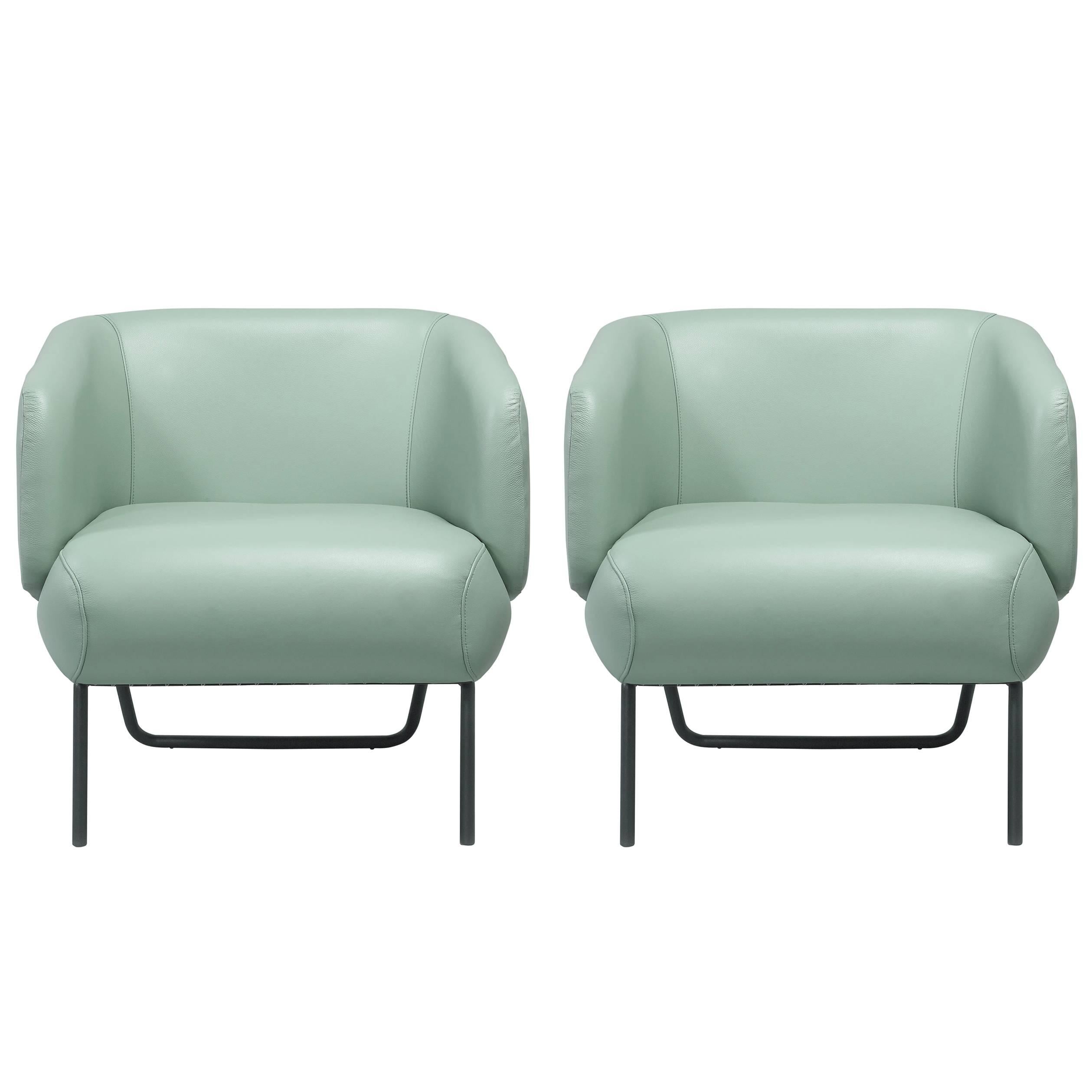 European modern pale teal green leather and black epoxy armchairs For Sale