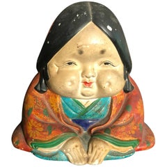 Antique Japanese Ceramic Doll Okame, Hand-Painted Gem from Early 20th Century