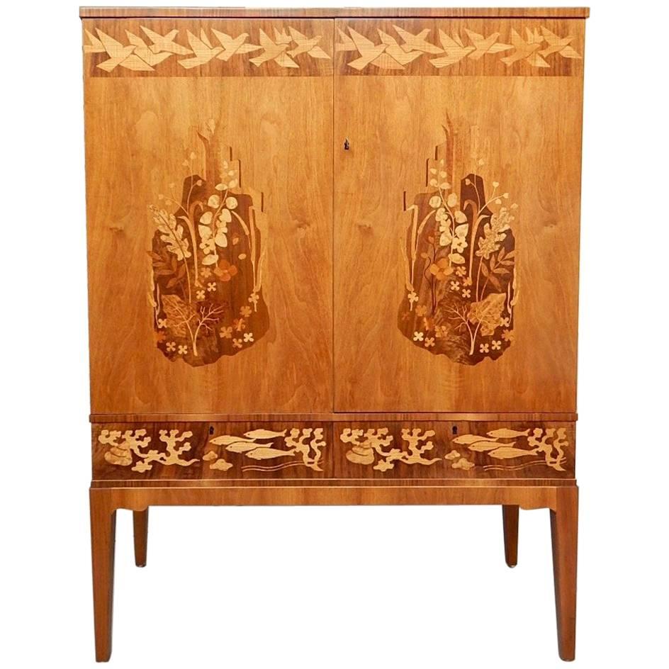 Swedish Mid-Century Cabinet with Flora and Fauna Motifs by Reiners Mobler For Sale