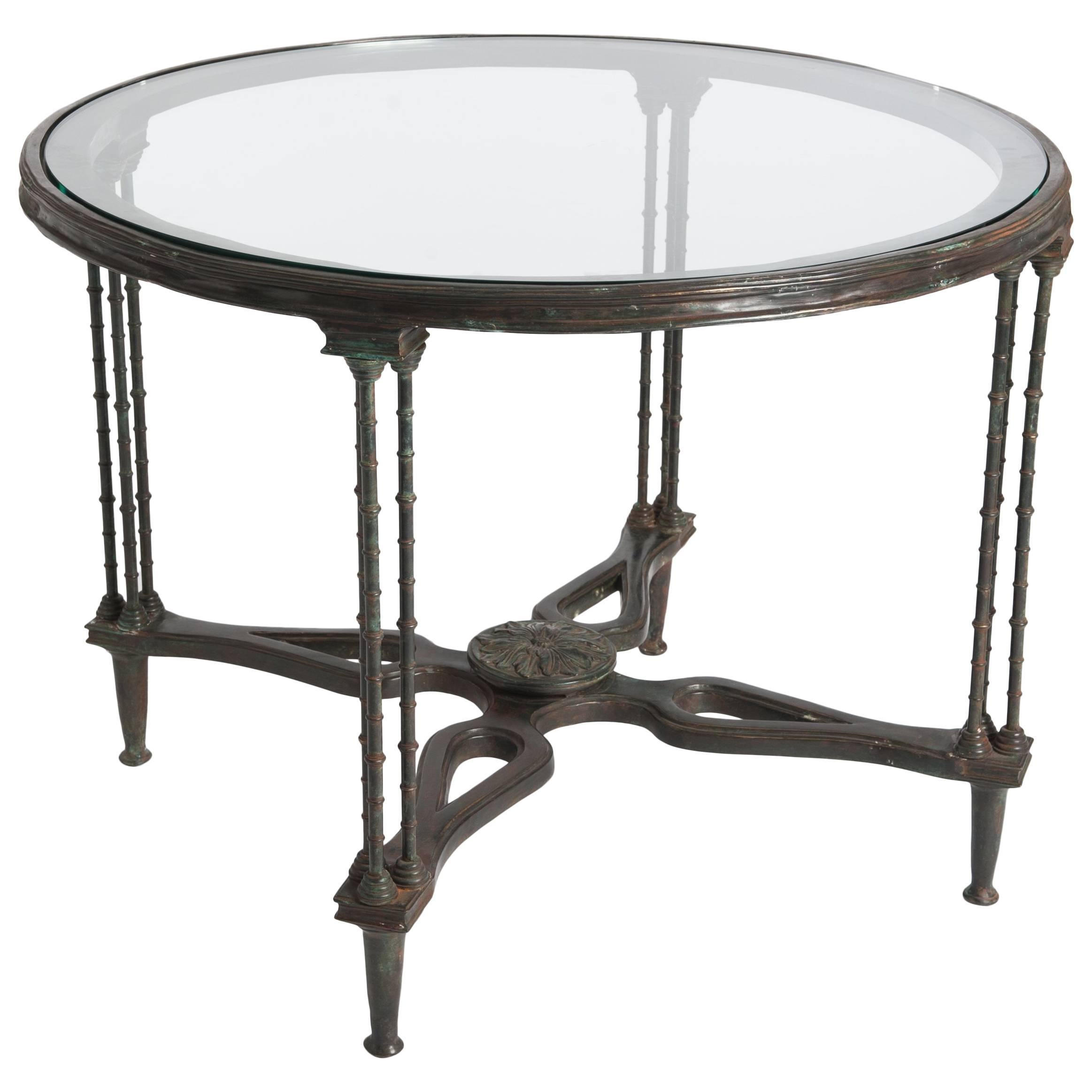 Extraordinary cast bronze Art Nouveau table, naturalistic design with fine bamboo legs, rosette centered with wonderful patina in green-grey color.
Aside from the glass top is also a brown-grey slate top available.
