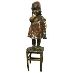 Bronze Figurine of Girl Standing on a Stool Signed by Juan Clara 