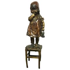Bronze Figurine of Girl Standing on a Stool Signed by Juan Clara