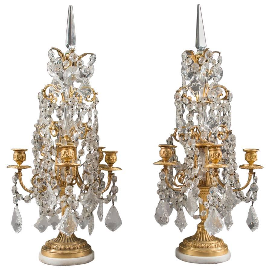 Paire de girandoles françaises de style Louis XVI du 19ème siècle en bronze doré et cristal